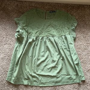 Green top with lace detail size L